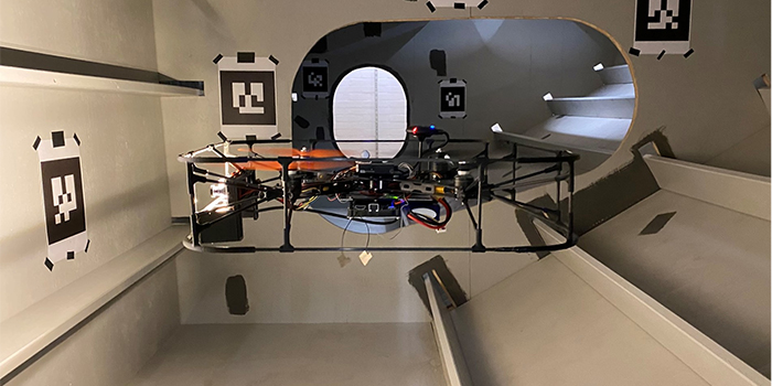 Drone about to fly through a small crew hole during the go-no-go test. (Photo: Evangelos Boukas)