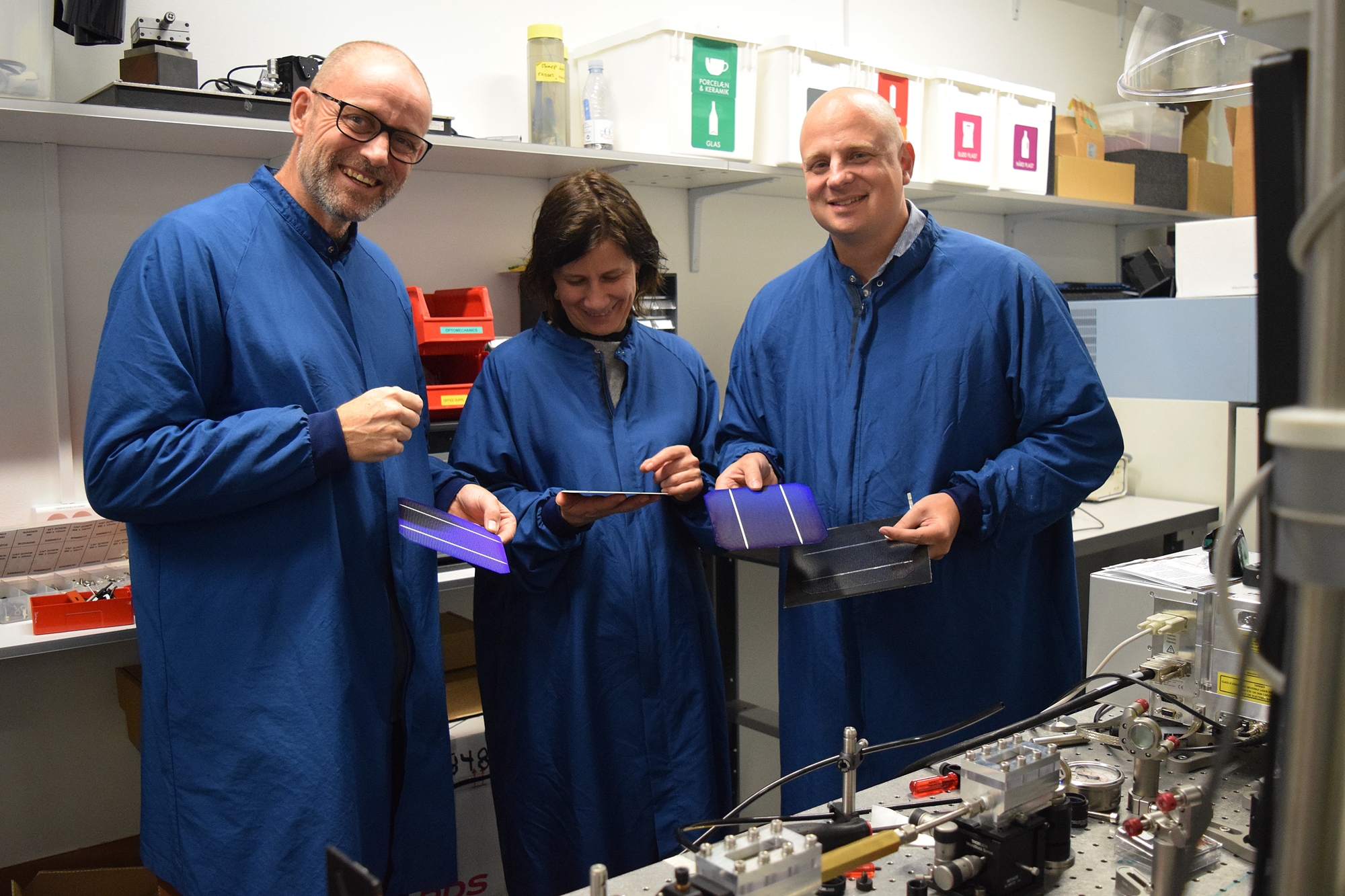 Ole Bang, Stela Canulescu, and Peter Poulsen in the lab